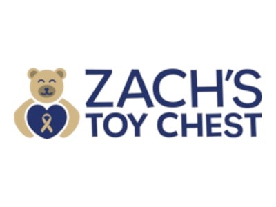 Logo of Zach's Toy Chest with a teddy bear holding a ribbon.