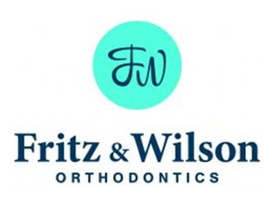 Fritz & Wilson Orthodontics logo with a turquoise circle and stylized "FW" initials.